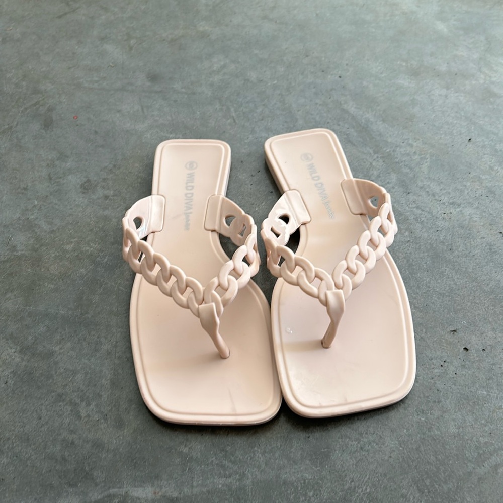 Wild diva lounge flip flops.
